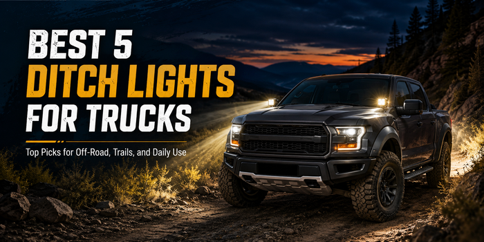 Black truck equipped with LED ditch lights driving on an off-road trail at night, highlighting the best ditch light setups for trucks and off-road use.