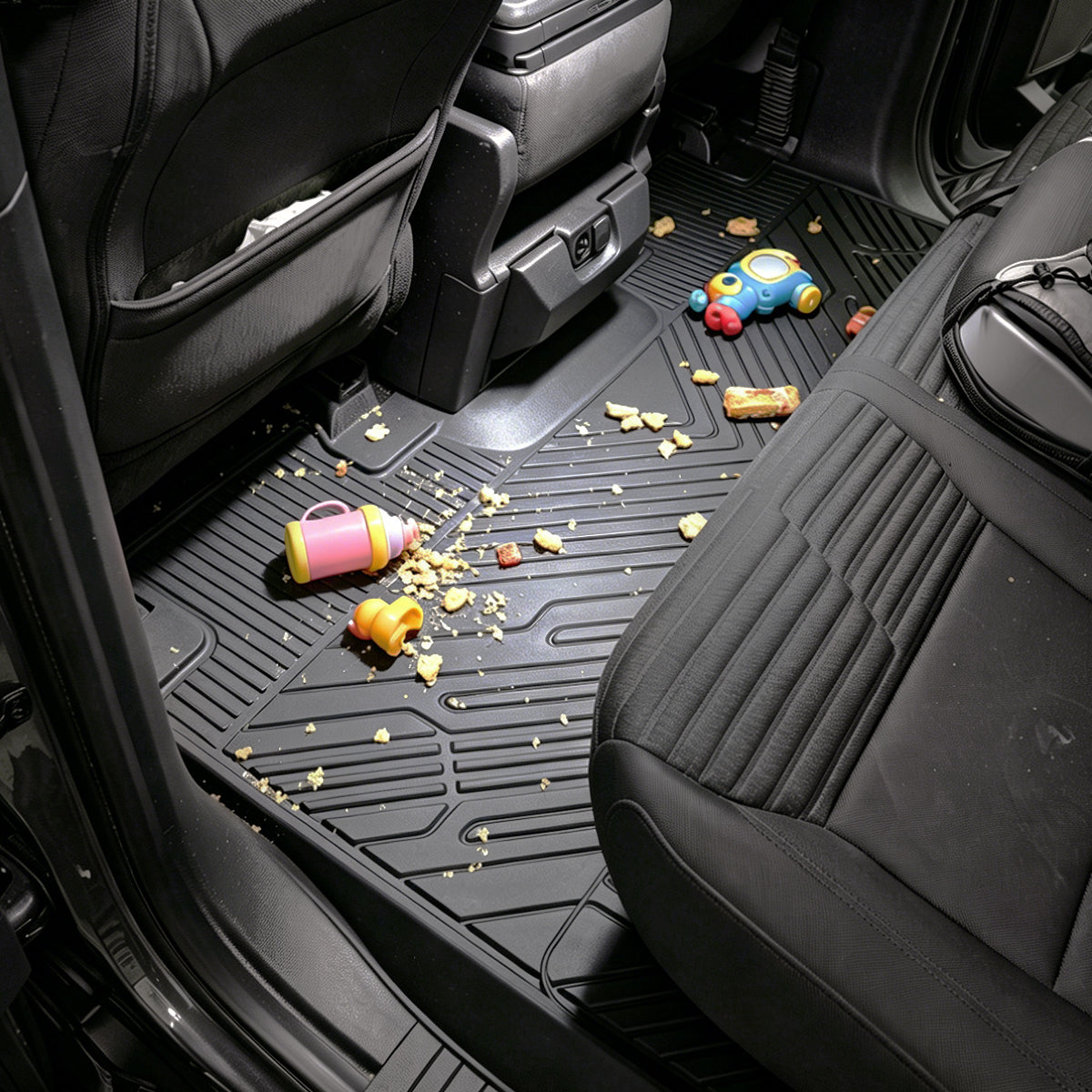 Ford F-150 floor mats containing crumbs snacks and small spills