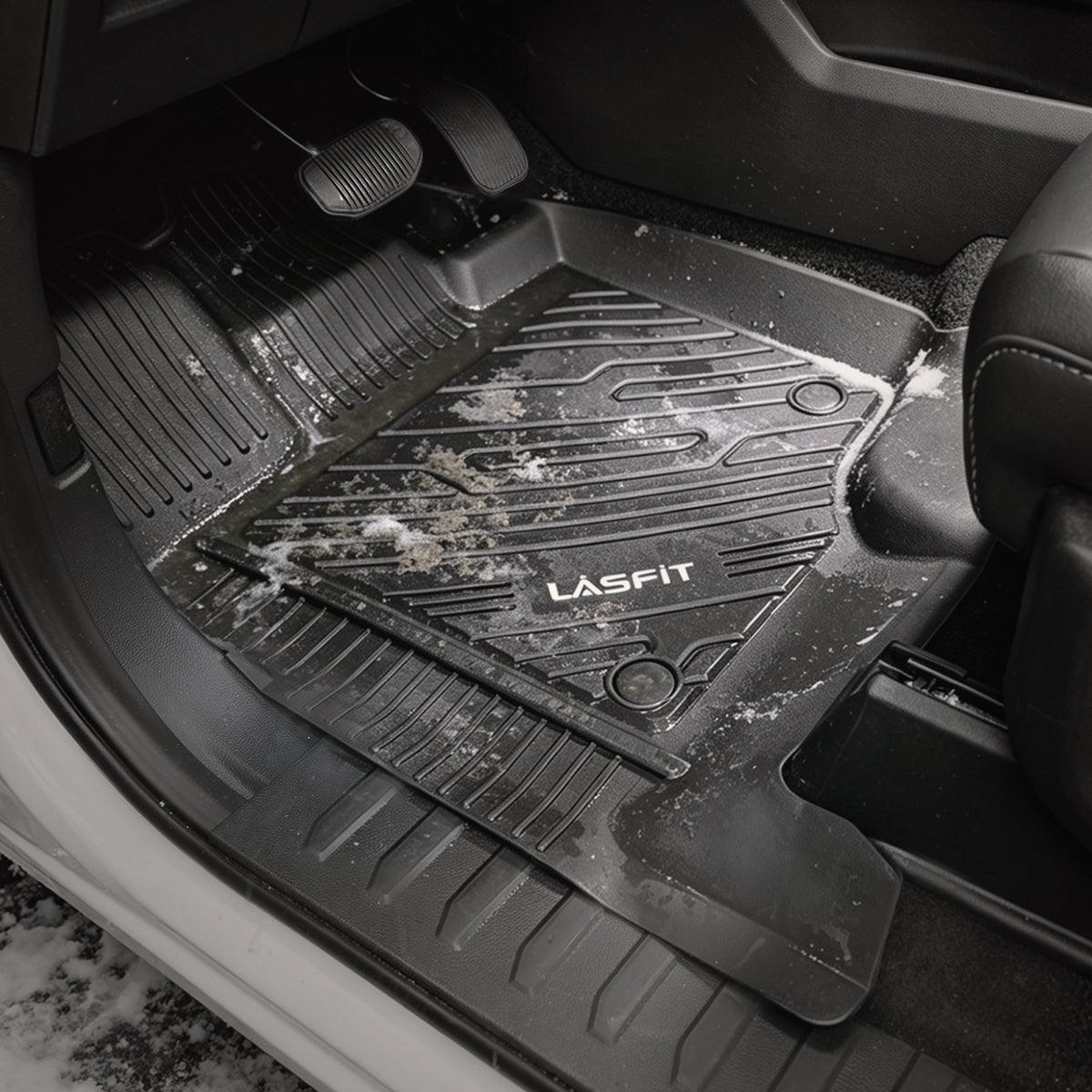 Ford F-150 floor mats protecting against snow slush and road salt