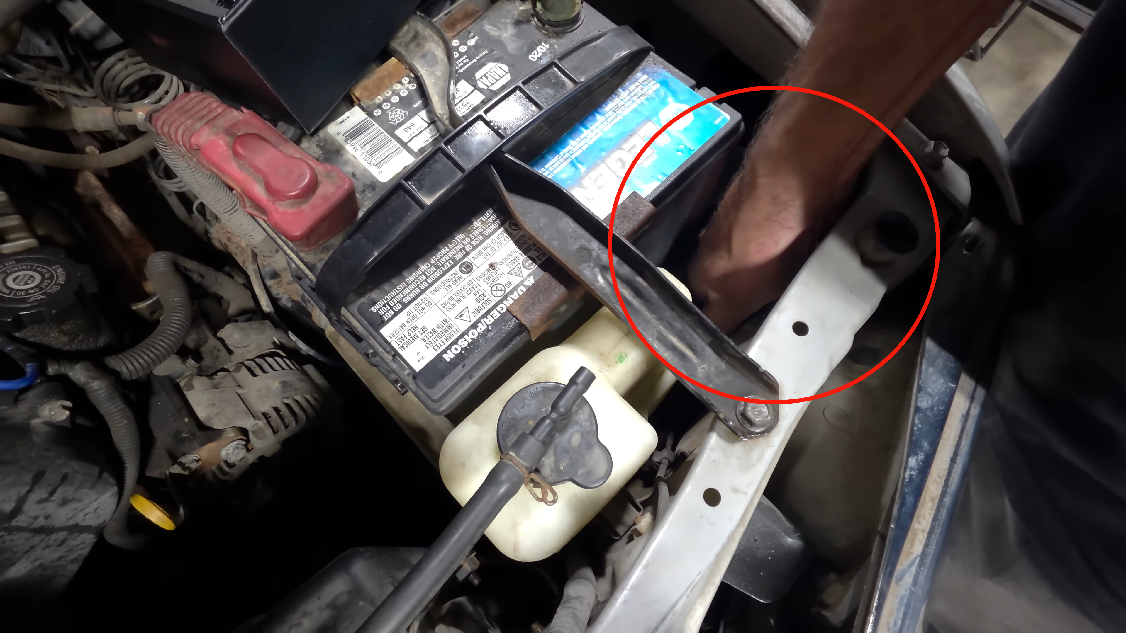 Pull the front grille forward and shift it slightly to create enough working space