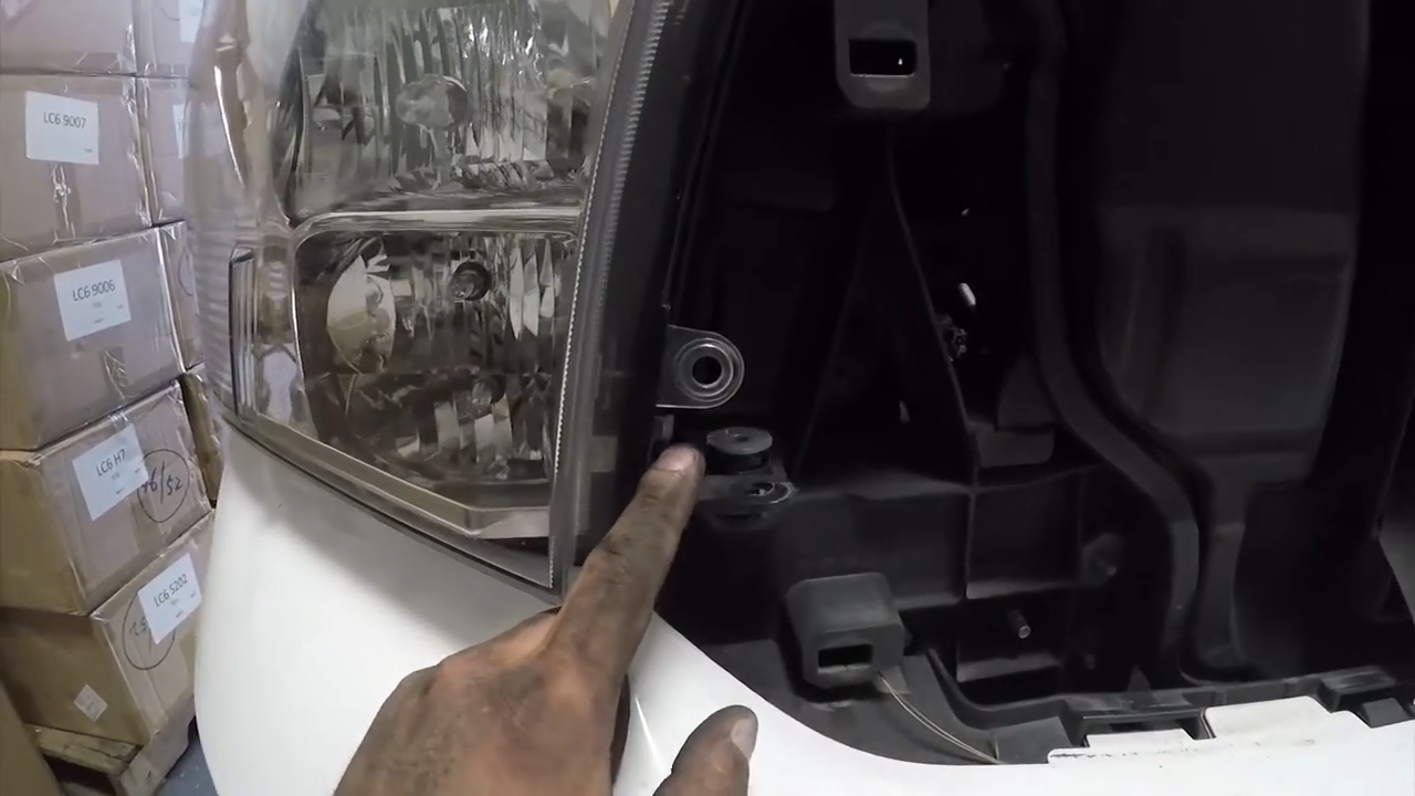 Remove the Bolt on the Side of the Headlight