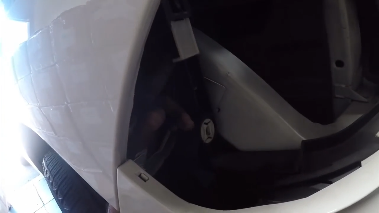 Access the Locking Clip Through the Fender