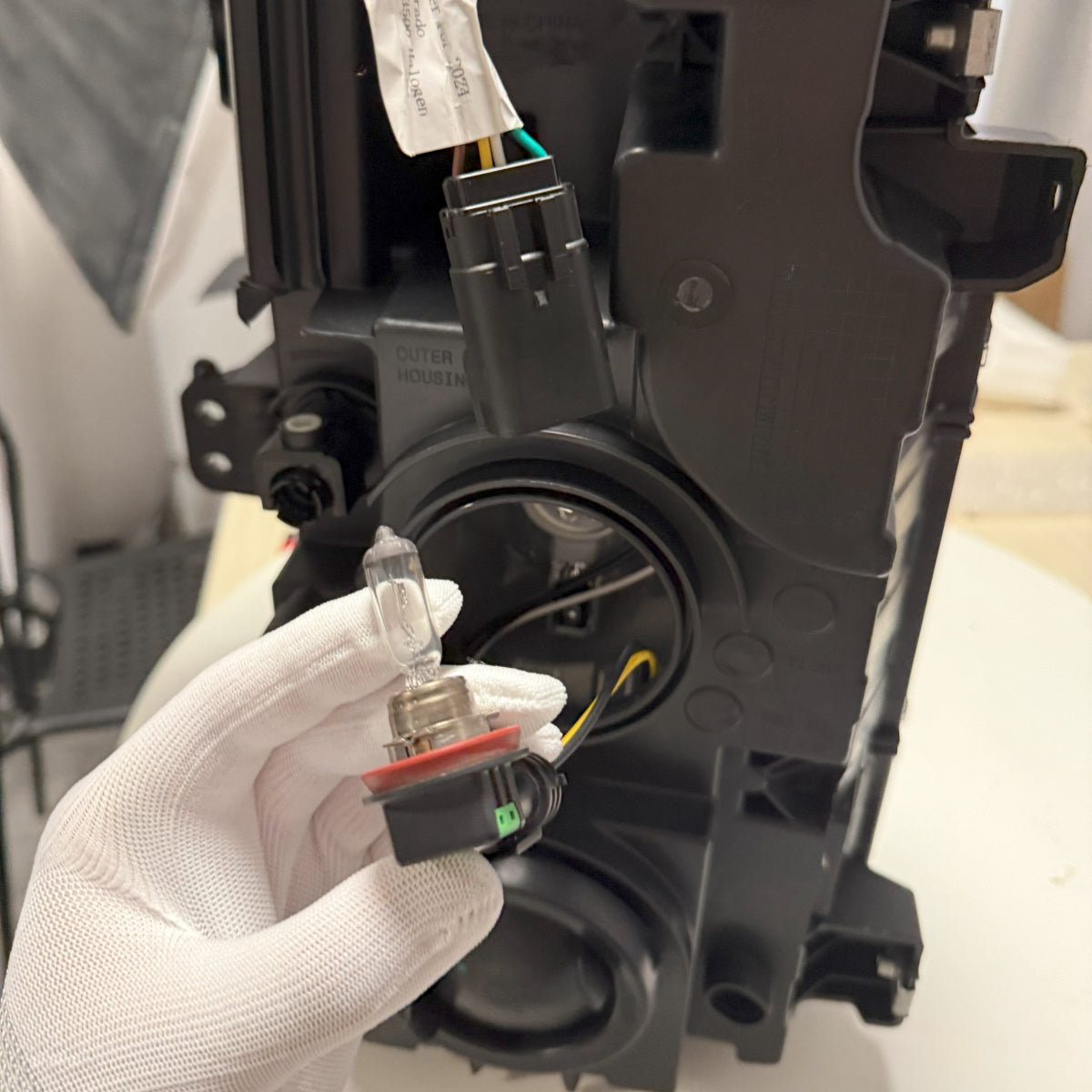 Remove the halogen bulbs from the headlight housing
